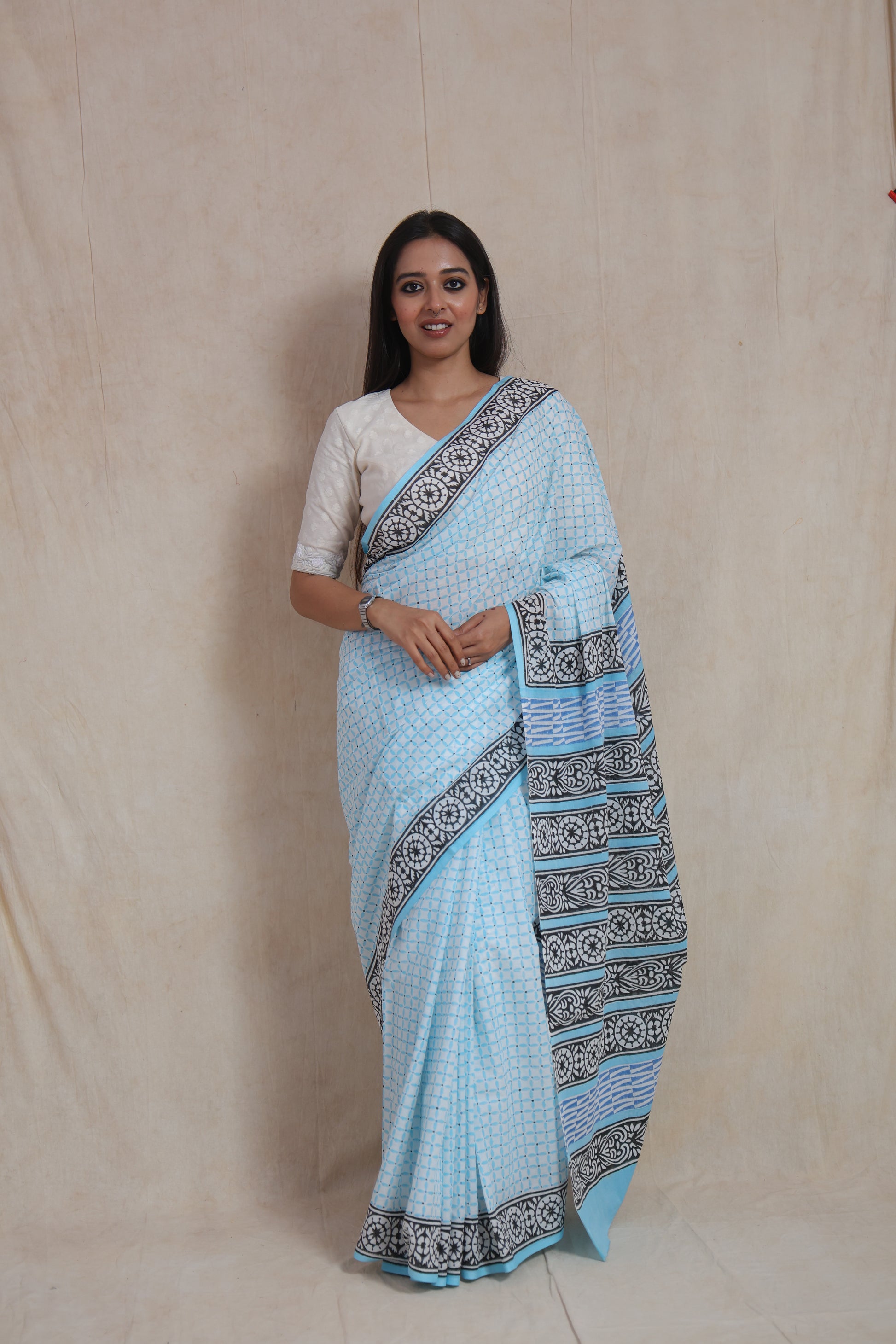 Full view of handcrafted sky blue Sanghnaree cotton saree