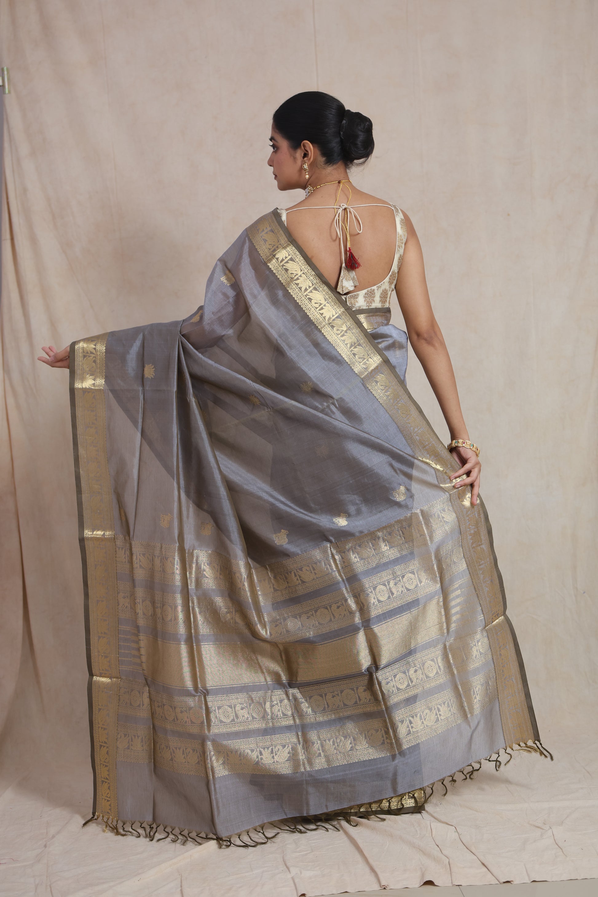 Back view of steel grey Kanchipuram Sico saree with rich woven pallu