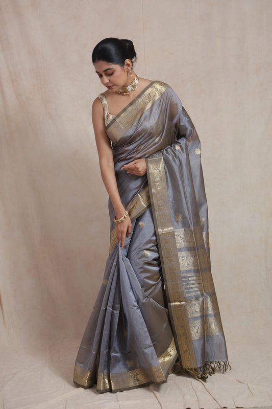 Front view of steel grey Kanchipuram Sico saree with gold zari border