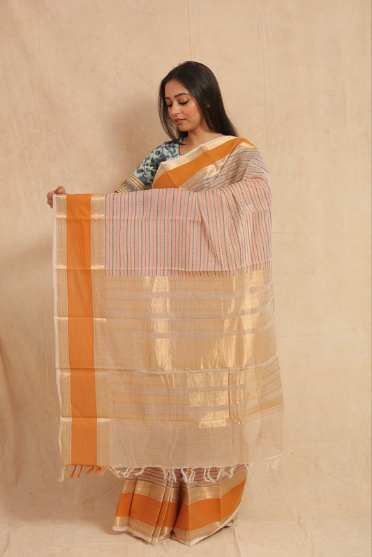 Close up of striped cotton saree with zari border detail