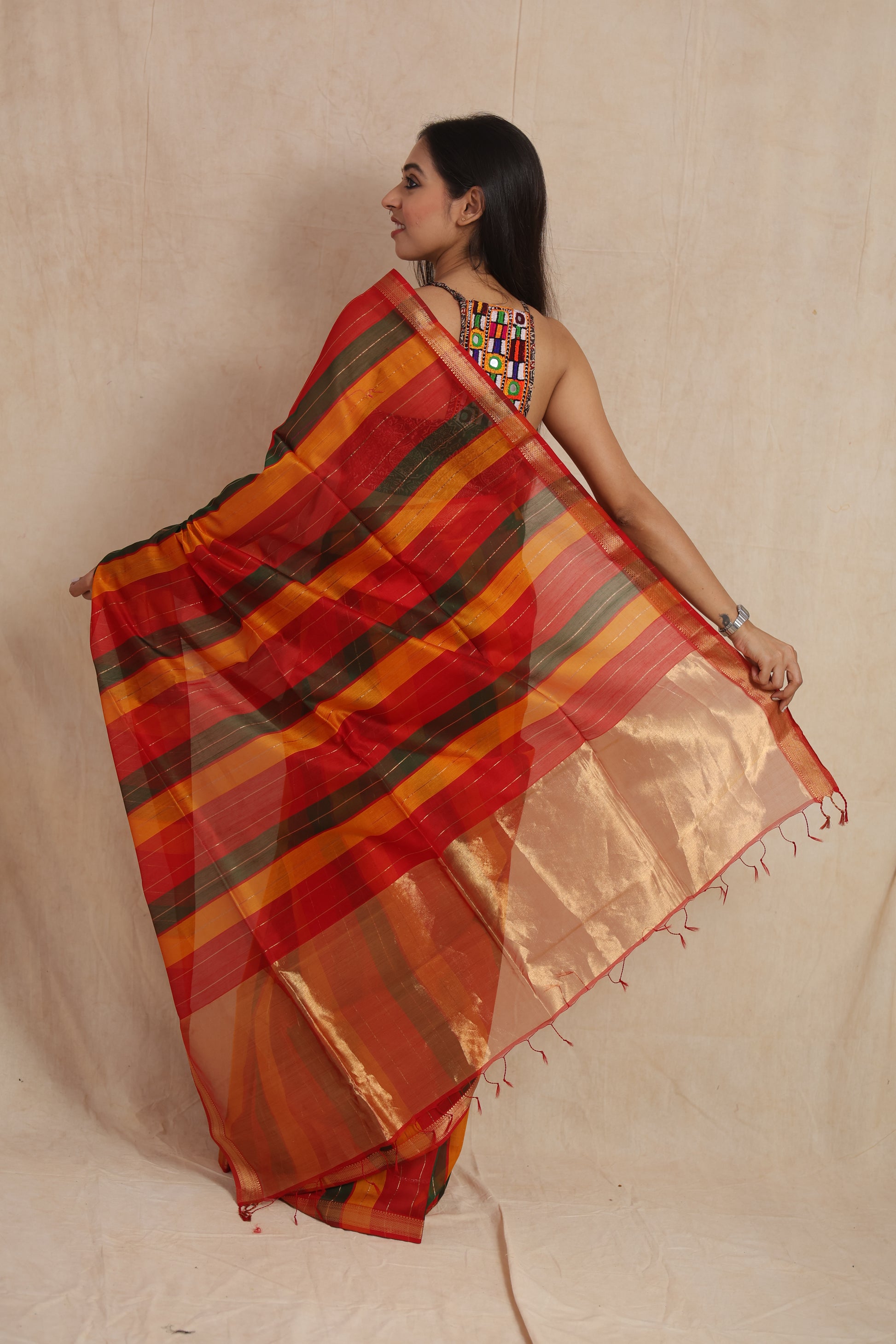 Back view of striped Maheshwari cotton saree showcasing pallu