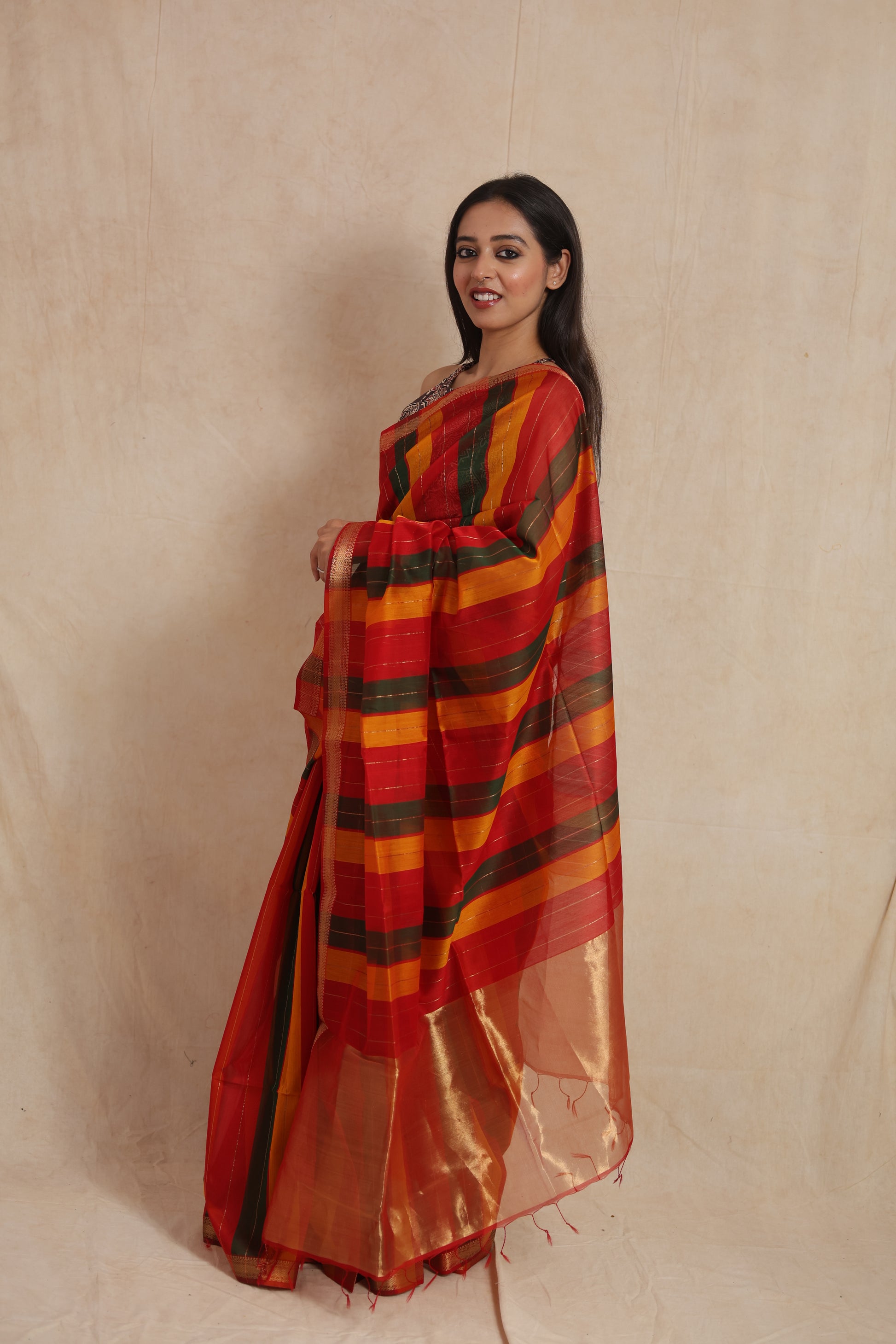 Side view of Maheshwari cotton saree with vibrant woven stripes