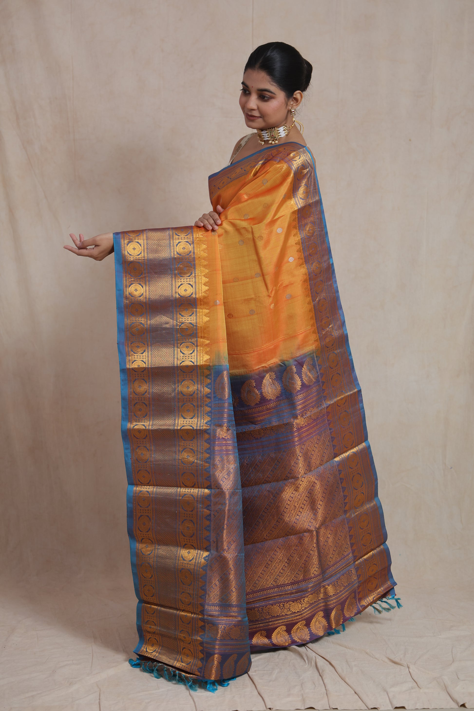 Pallu display of Gadwal silk saree featuring detailed zari motifs