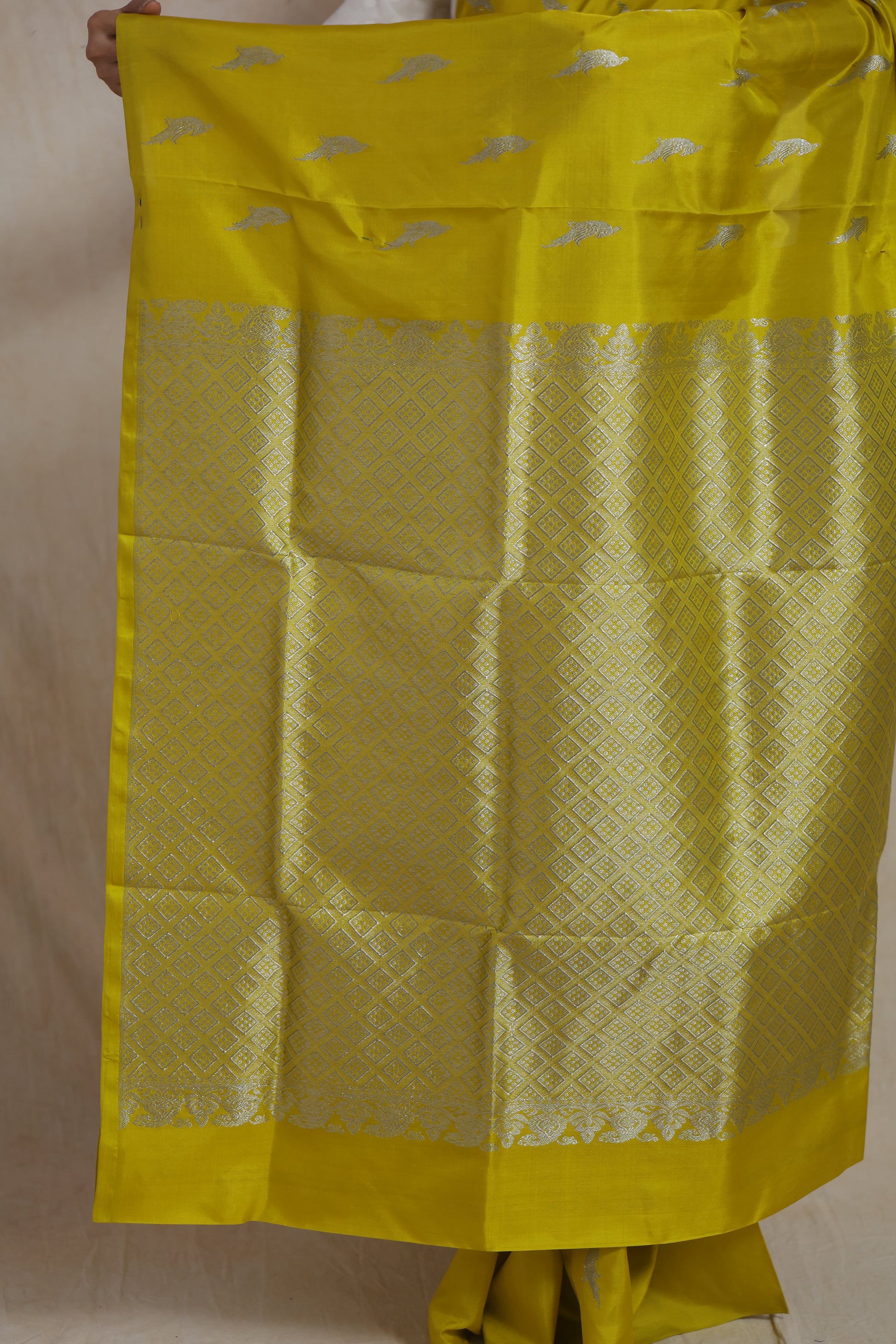 Rich woven pallu detail of sunshine yellow Venkatgiri silk saree
