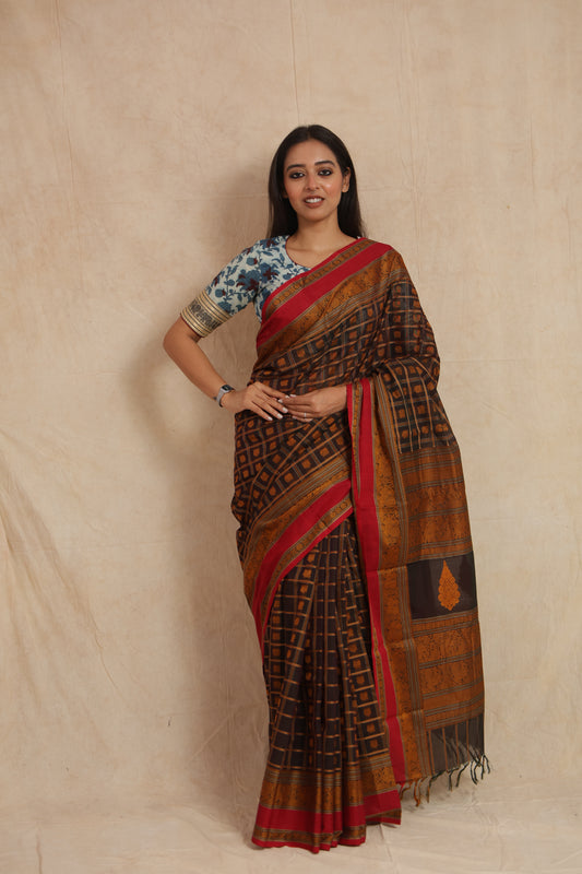 Full-length look of black Kanchipuram cotton saree with woven checked body and rich pallu