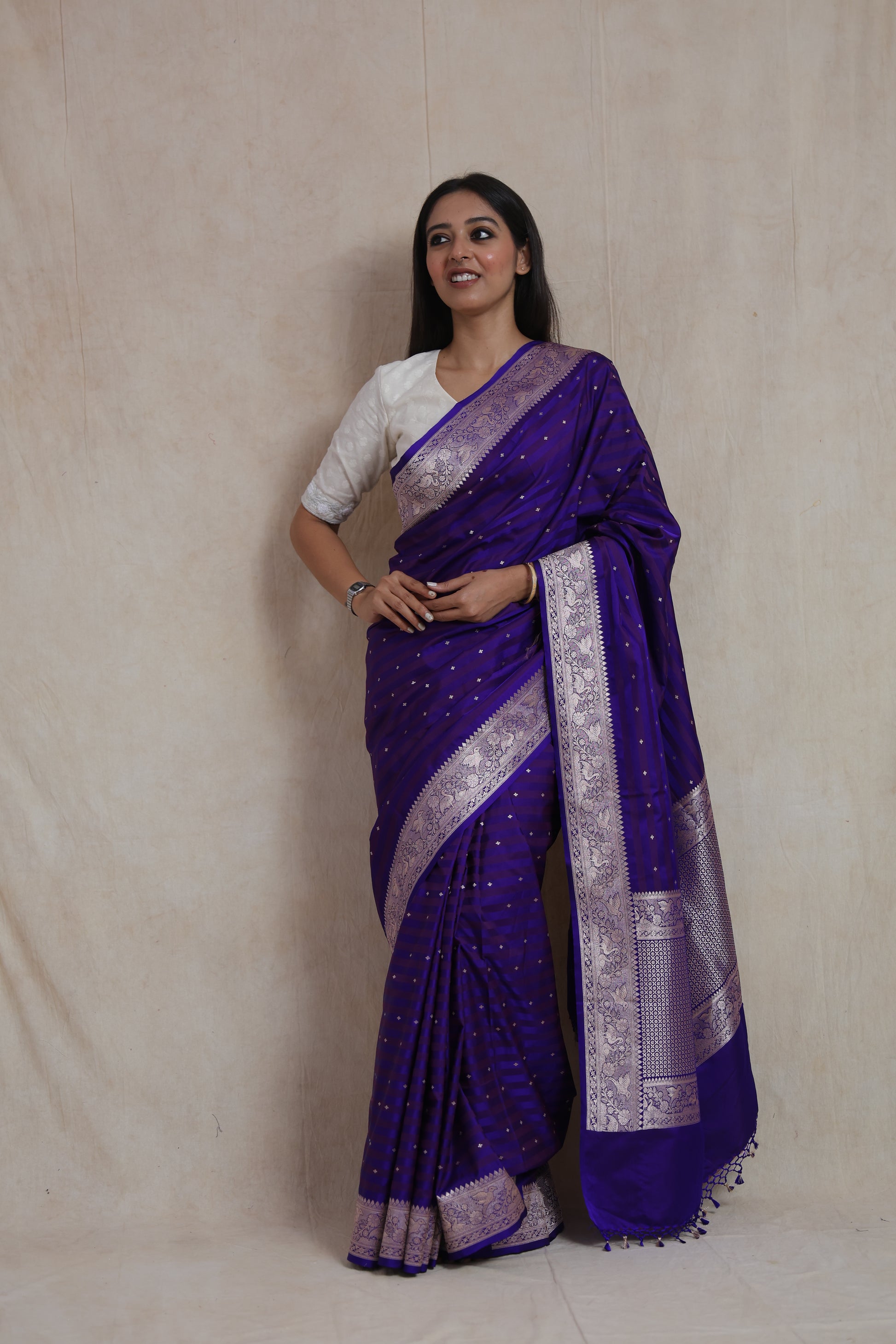 Side profile of royal indigo Banarasi Art Silk saree with woven motifs and rich pallu