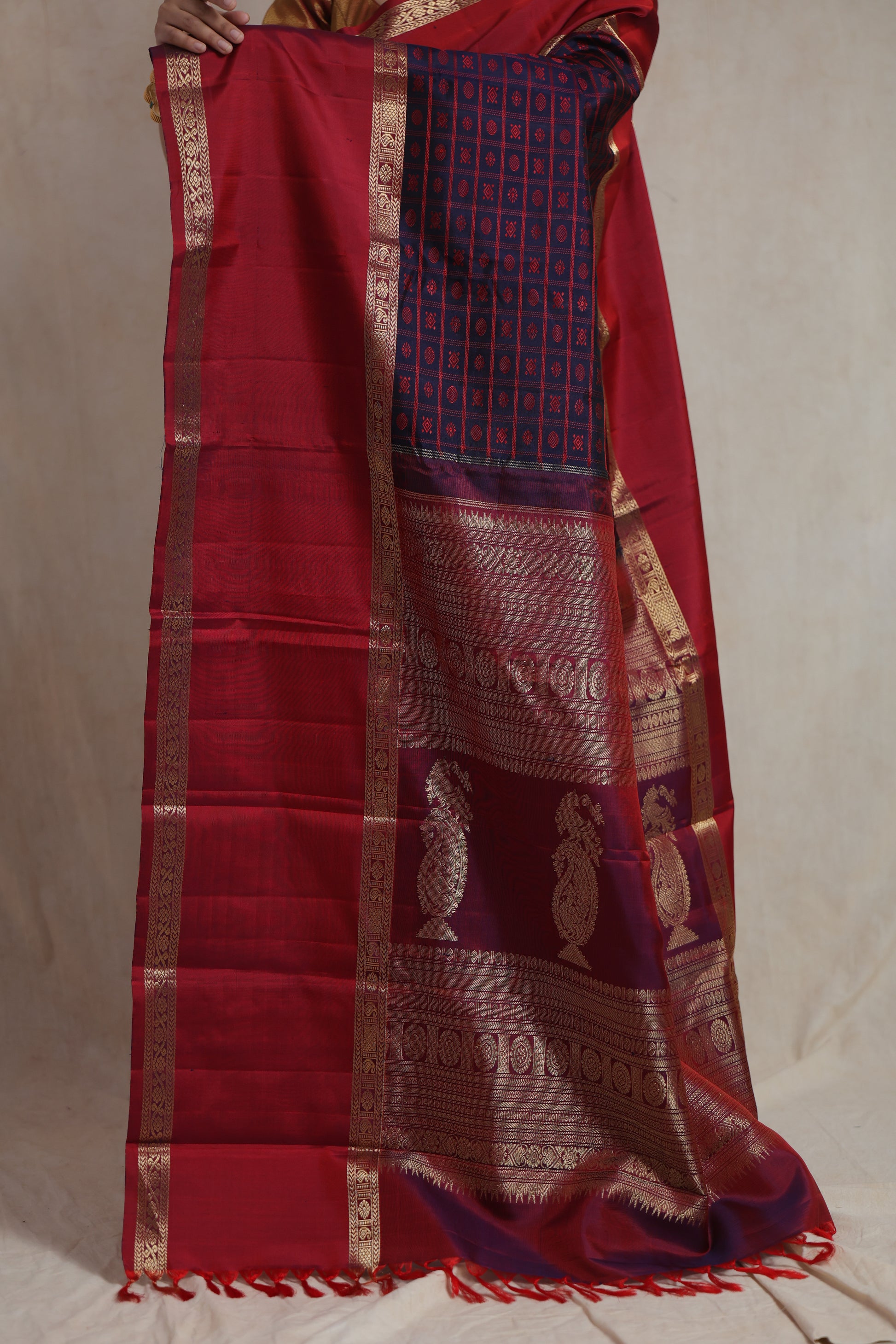 Close-up of navy blue and crimson zari woven Kanjivaram silk pallu