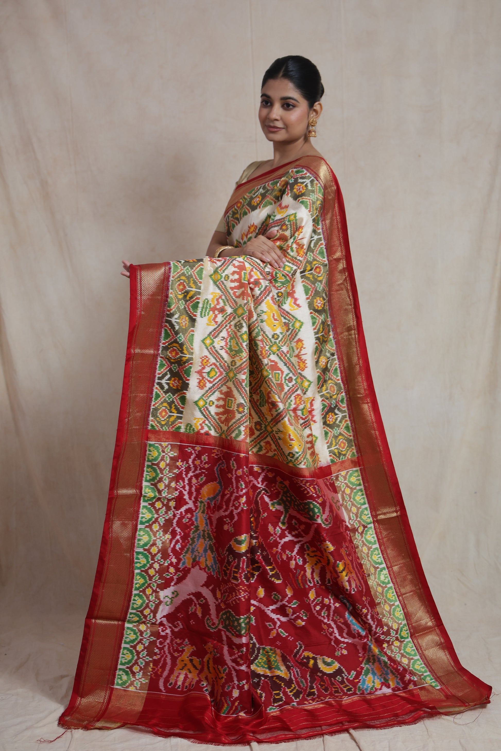 Full view of ivory Panchampali silk saree with intricate geometric woven motifs