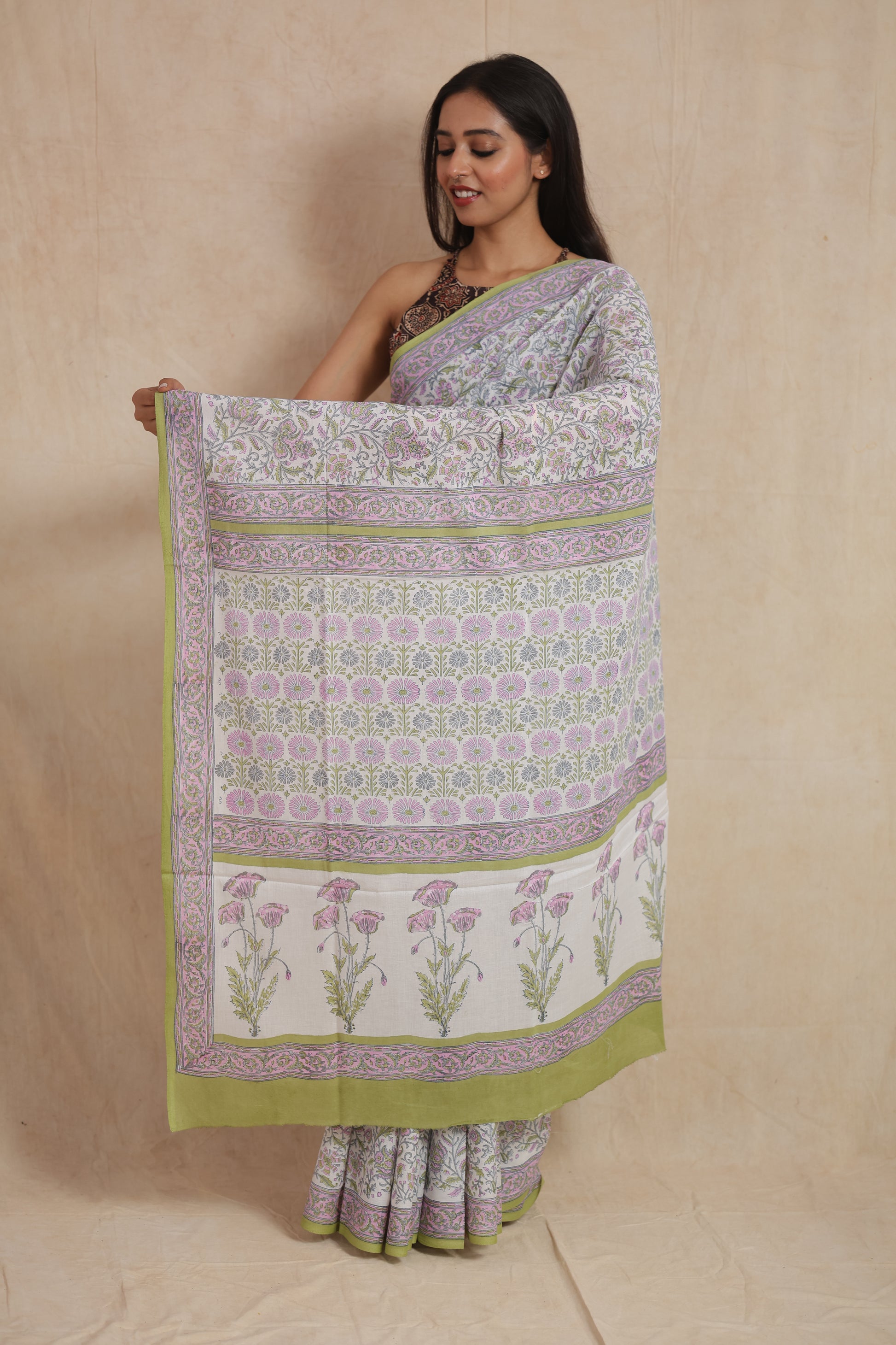 Traditional pastel Sanganeri cotton saree with floral pallu