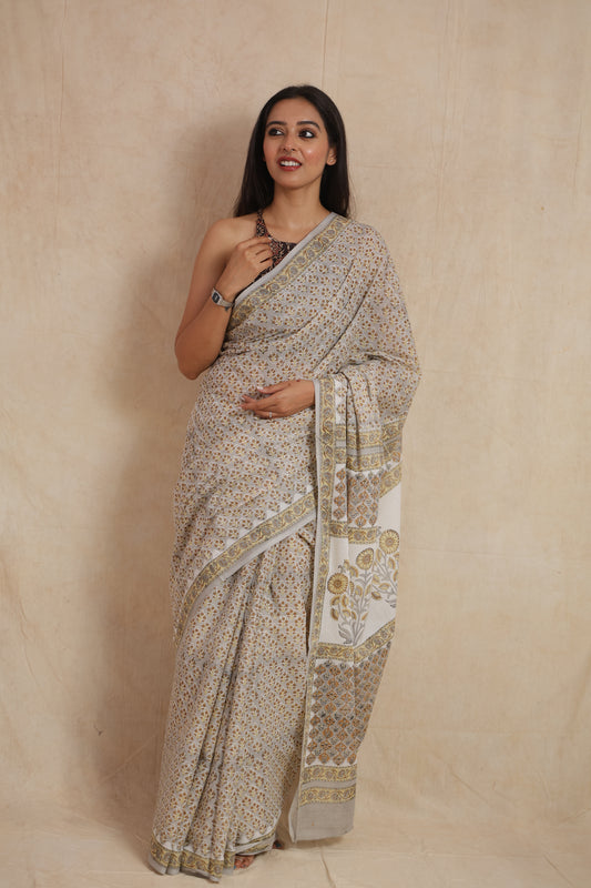 Elegant beige Sanghaneri cotton saree with floral motifs