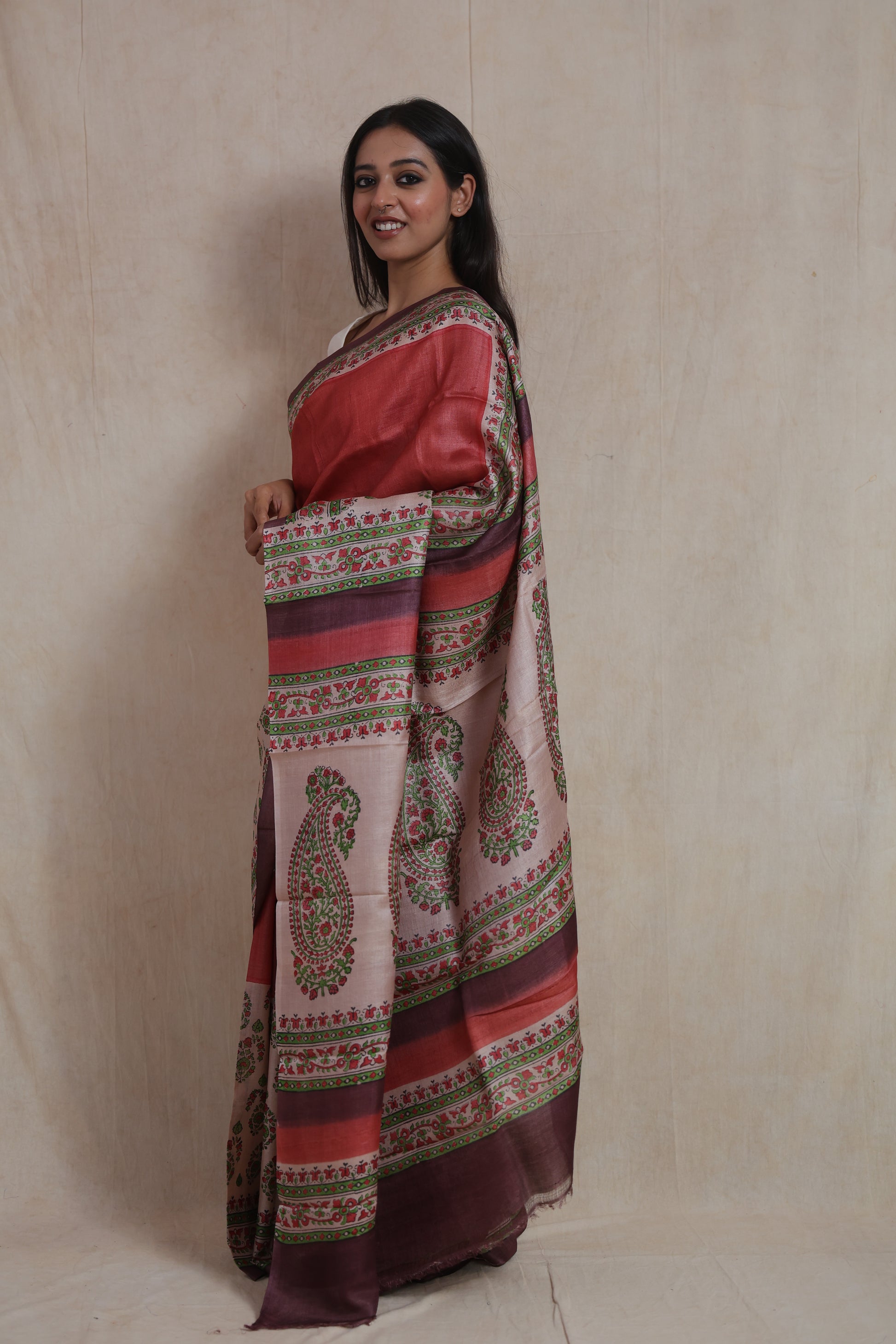 Side profile of elegant Tussar print saree with printed pallu