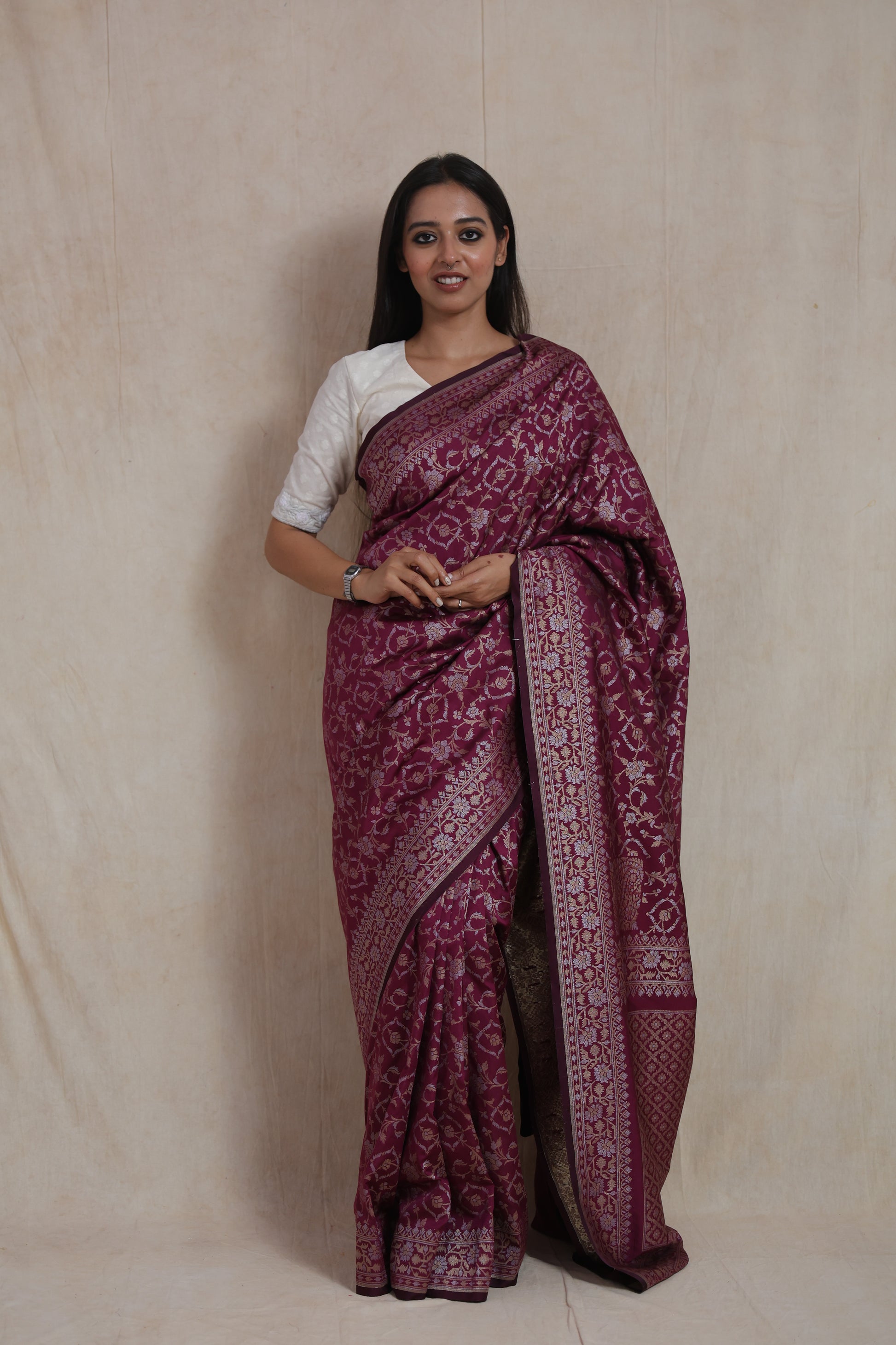 Full look of wine Banarasi art silk saree with rich woven border and pallu