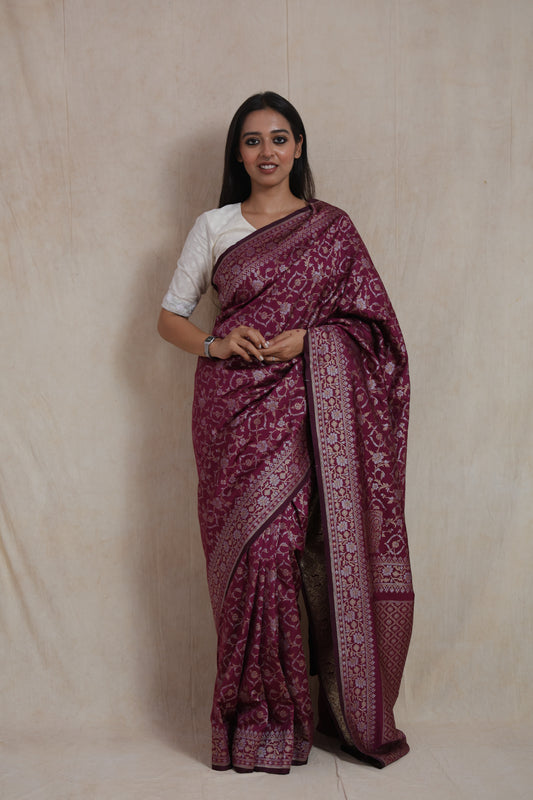 Full look of wine Banarasi art silk saree with rich woven border and pallu